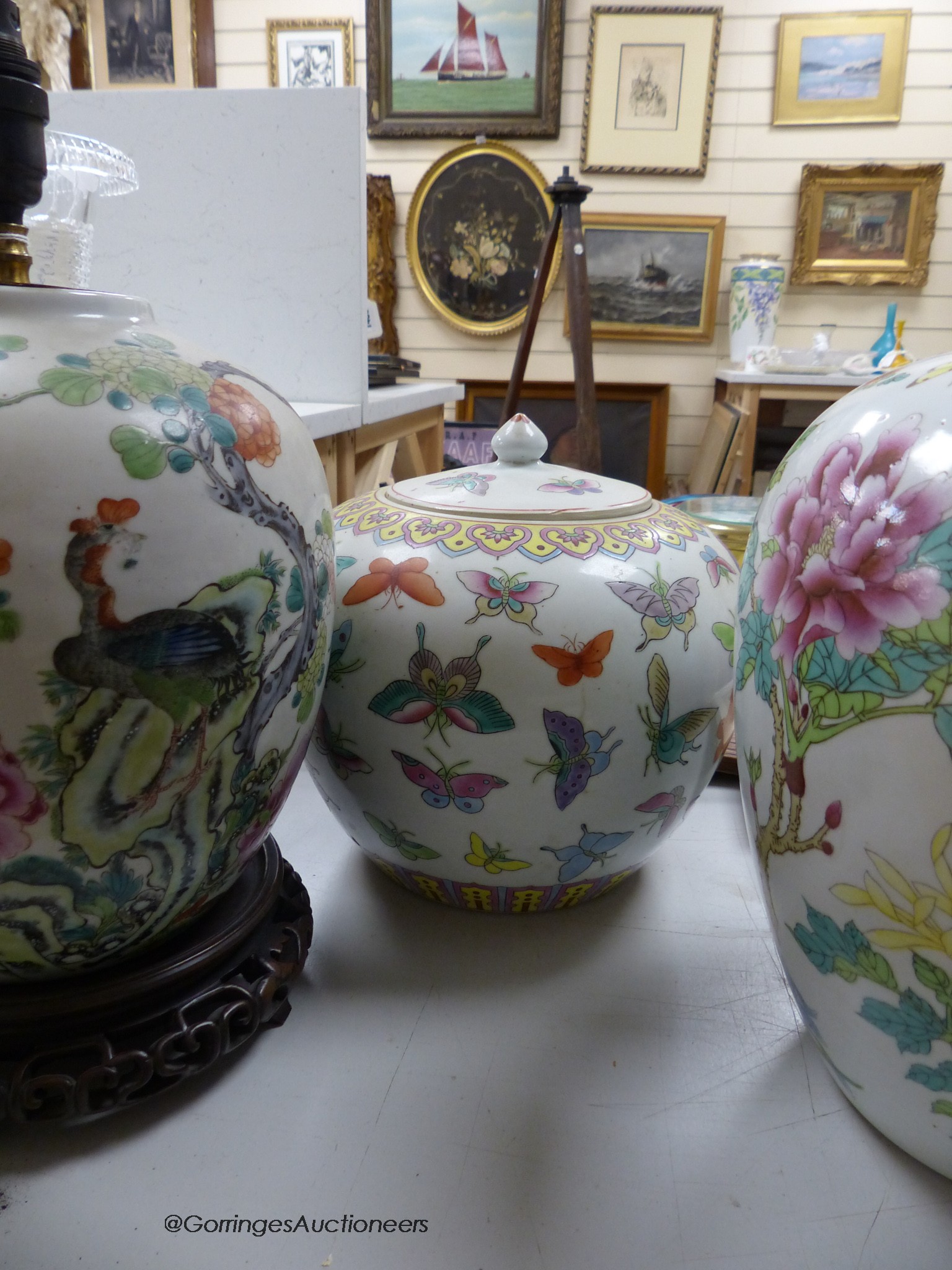 Two Chinese jars and covers and another converted to a lamp, tallest 22cm excl. light fitting